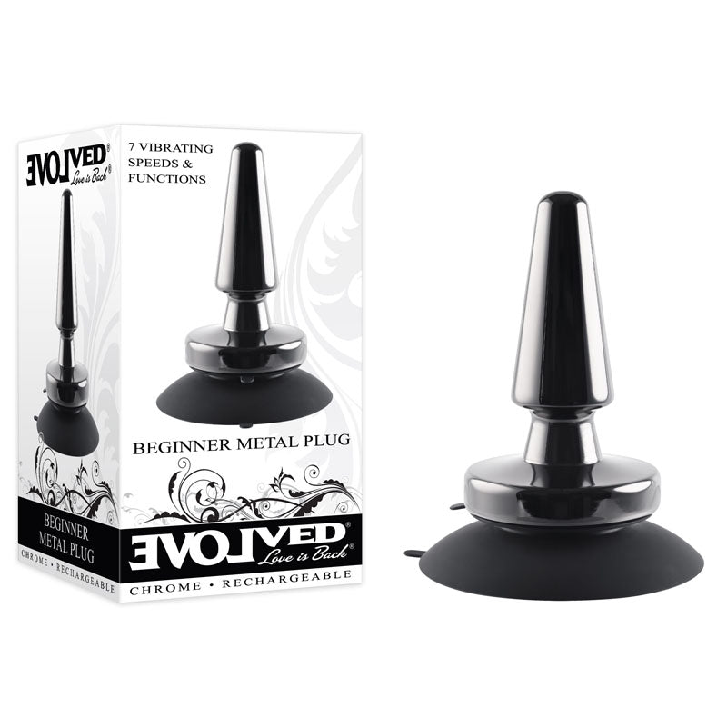 Evolved BEGINNER METAL PLUG - Black 11.2 cm USB Rechargeable Vibrating Butt Plug next to the box packaging.