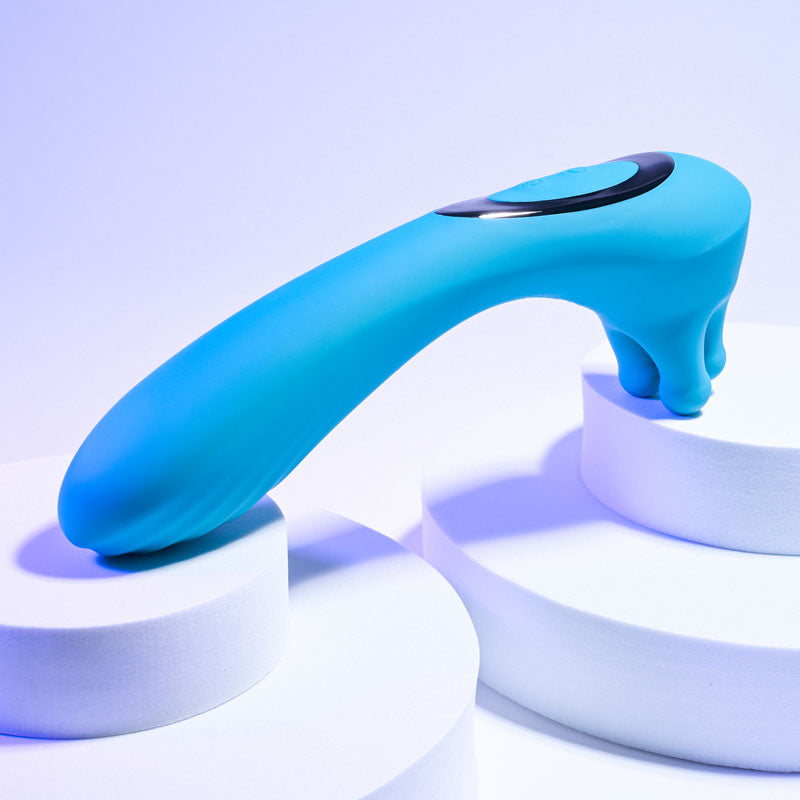 Evolved HEADS OR TAILS - Blue 19.3 cm USB Rechargeable Dual Ended Massager on display.