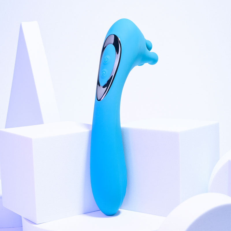 Evolved HEADS OR TAILS - Blue 19.3 cm USB Rechargeable Dual Ended Massager against a minimalist backdrop.
