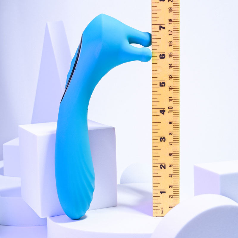 Evolved HEADS OR TAILS - Blue 19.3 cm USB Rechargeable Dual Ended Massager next to a ruler for size reference.