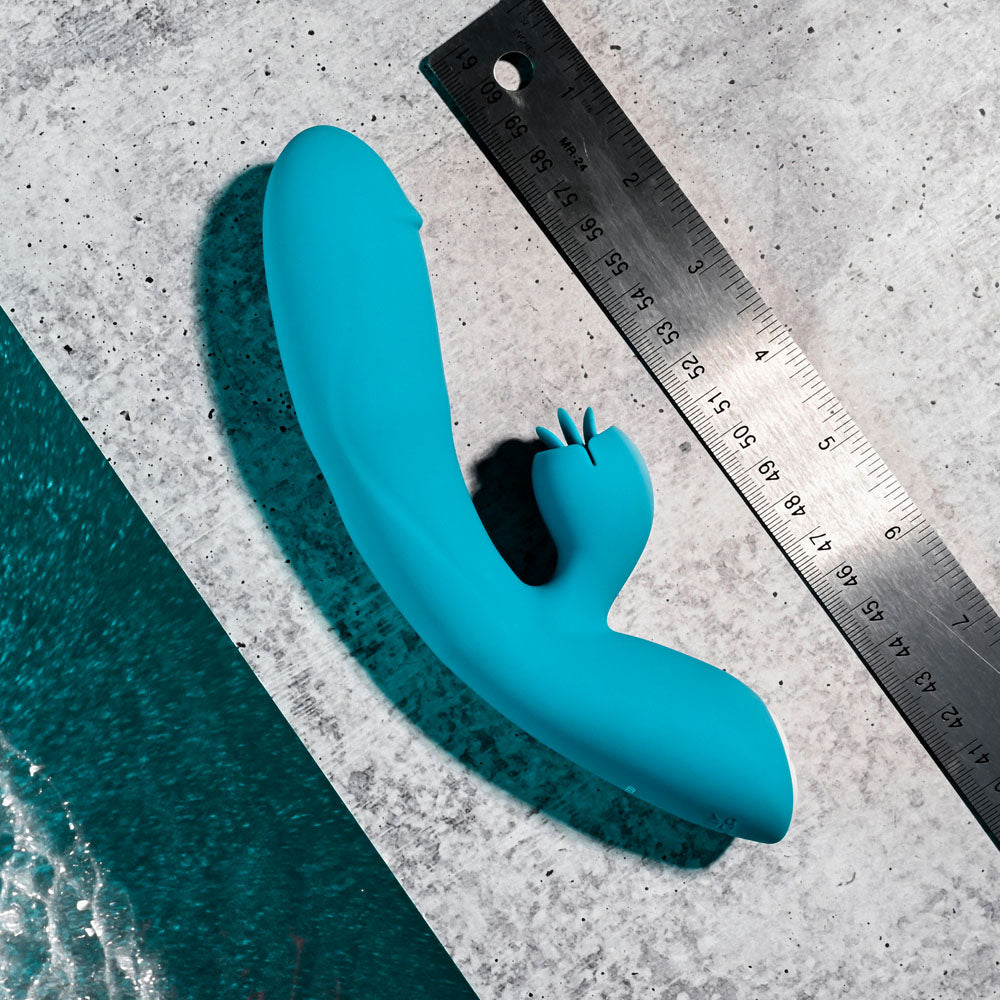 Evolved FIERCE FLICKER - 19.5 cm USB Rechargeable Rabbit Flicker Vibrator next to a ruler for size reference.