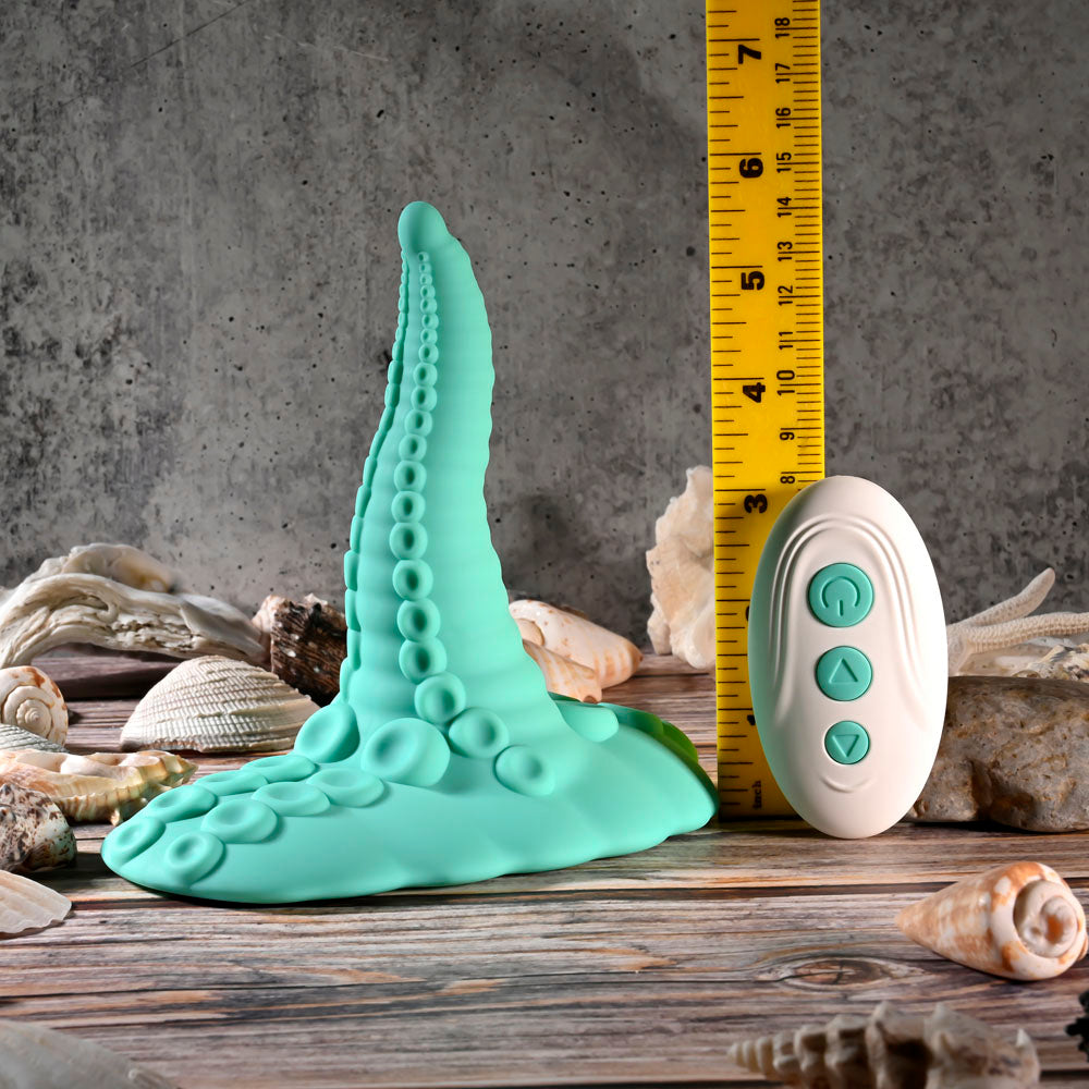Evolved TENTACLE GRINDER -  USB Rechargeable Fantasy Grinder Pad with Wireless Remote, featuring a tentacle shape and control remote.