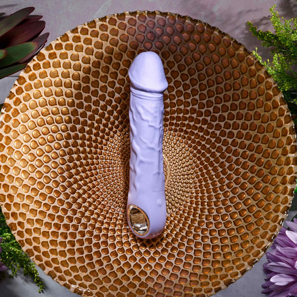 Evolved FANTASY -  18.4 cm USB Rechargeable Vibrator placed in a decorative bowl, showcasing its lifelike design.
