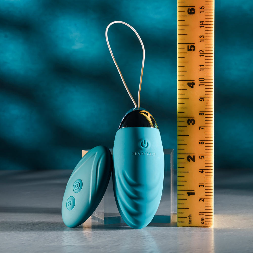 Evolved OVAL OFFICE -  8.5 cm USB Rechargeable Wireless Egg with Remote Control placed near a ruler for size comparison.