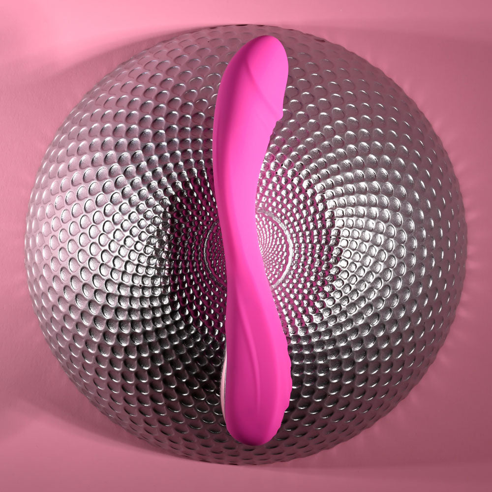 Evolved SUGAR RUSH - 21.6 cm USB Rechargeable Vibrator on a textured background