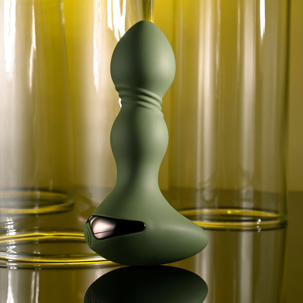 Evolved LIEUTENANT - 12.2 cm USB Rechargeable Vibrating Butt Plug on a reflective surface with a green design.