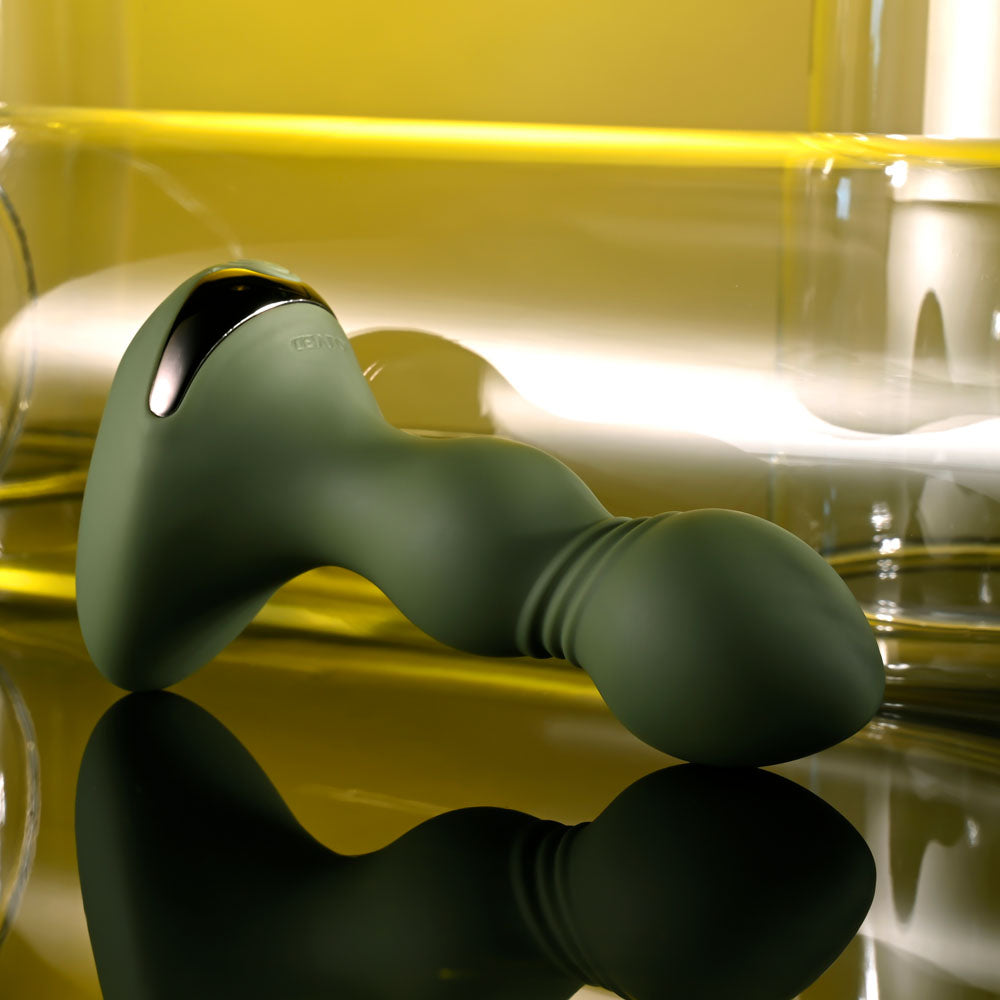 Evolved LIEUTENANT - 12.2 cm USB Rechargeable Vibrating Butt Plug in sleek green design on reflective surface.