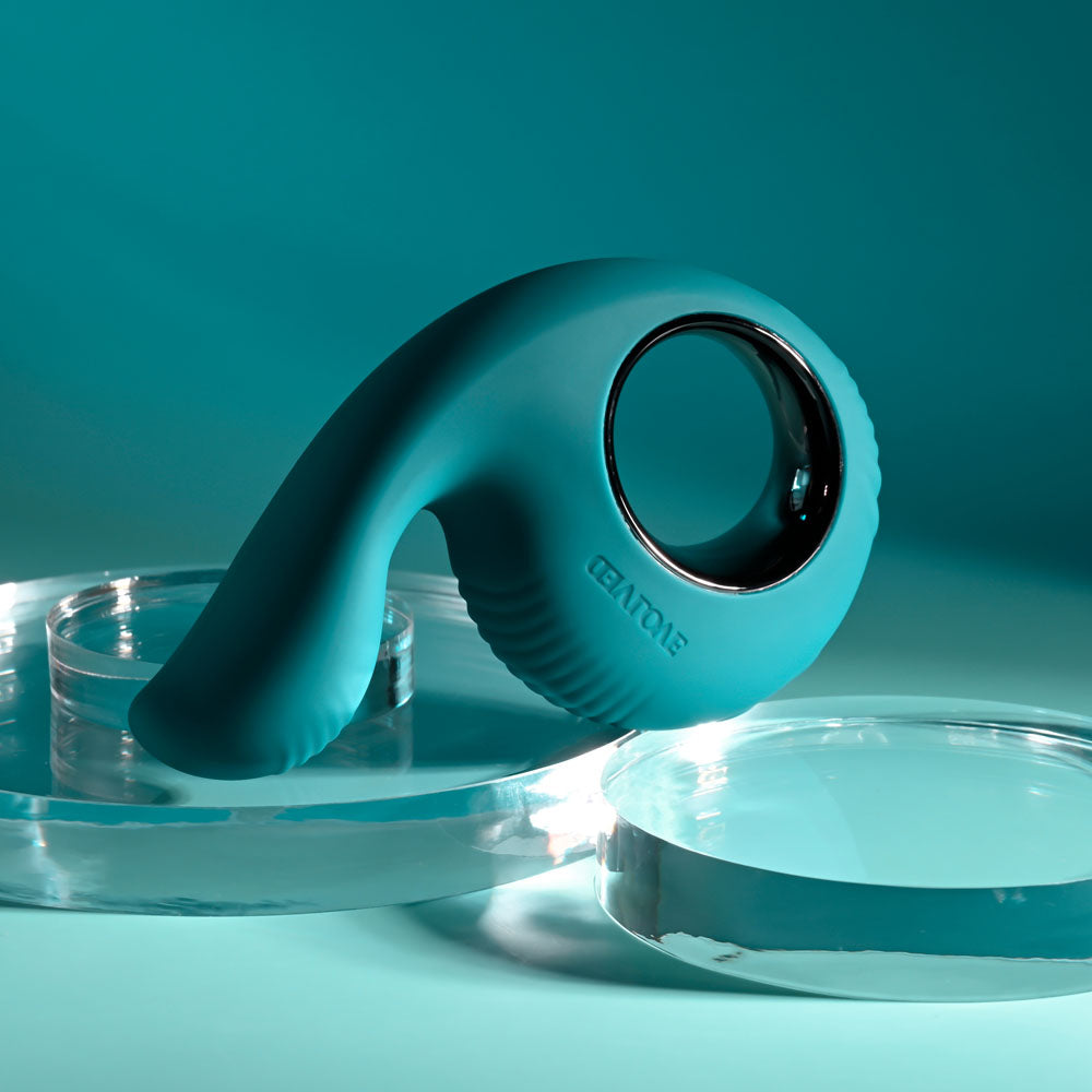 Evolved THUMBS UP -  USB Rechargeable Stimulator on a sleek surface, highlighting its innovative design and features.