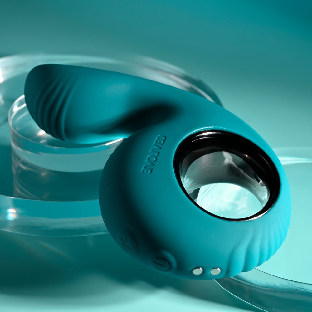 Evolved THUMBS UP - USB Rechargeable Stimulator in teal with textured shaft and ringed safety base.