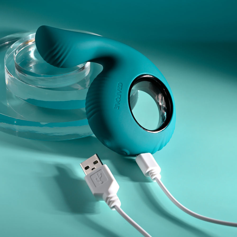 Evolved THUMBS UP - USB Rechargeable Stimulator in teal color with USB charging cable, ideal intimate essential for her.