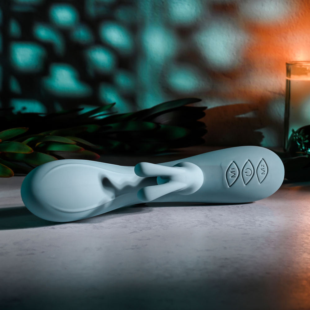 Evolved BOSS BUNNY - Baby 20.1 cm USB Rechargeable Rabbit Vibrator on a surface with soft lighting.
