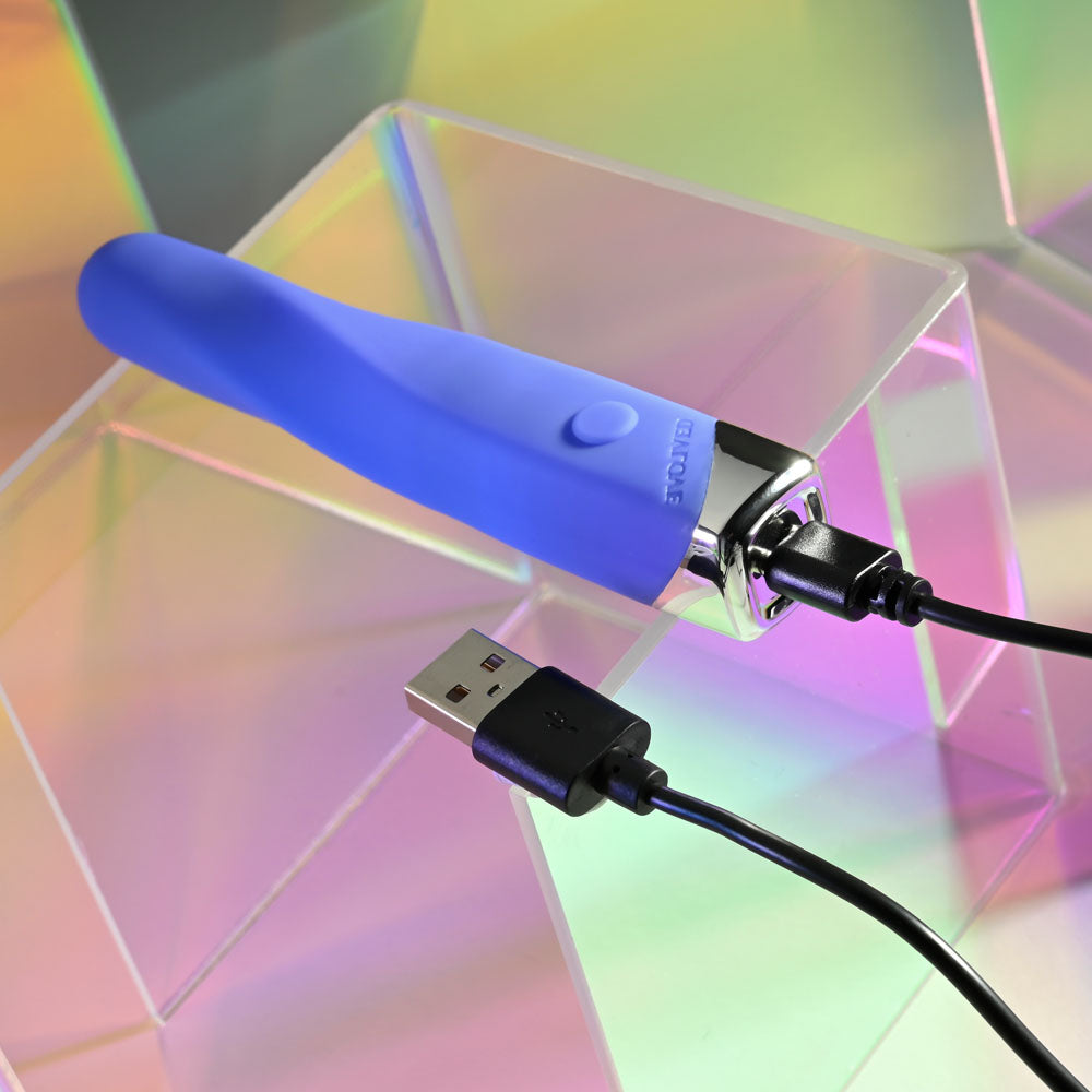 Evolved TWISTED TEMPTATION - 12 cm USB Rechargeable Bullet in blue with USB connection on a colorful background.