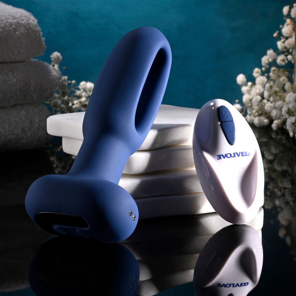 Evolved THE FLAPPER - 14 cm USB Rechargeable Vibrating and Flapping Butt Plug with Remote on display.