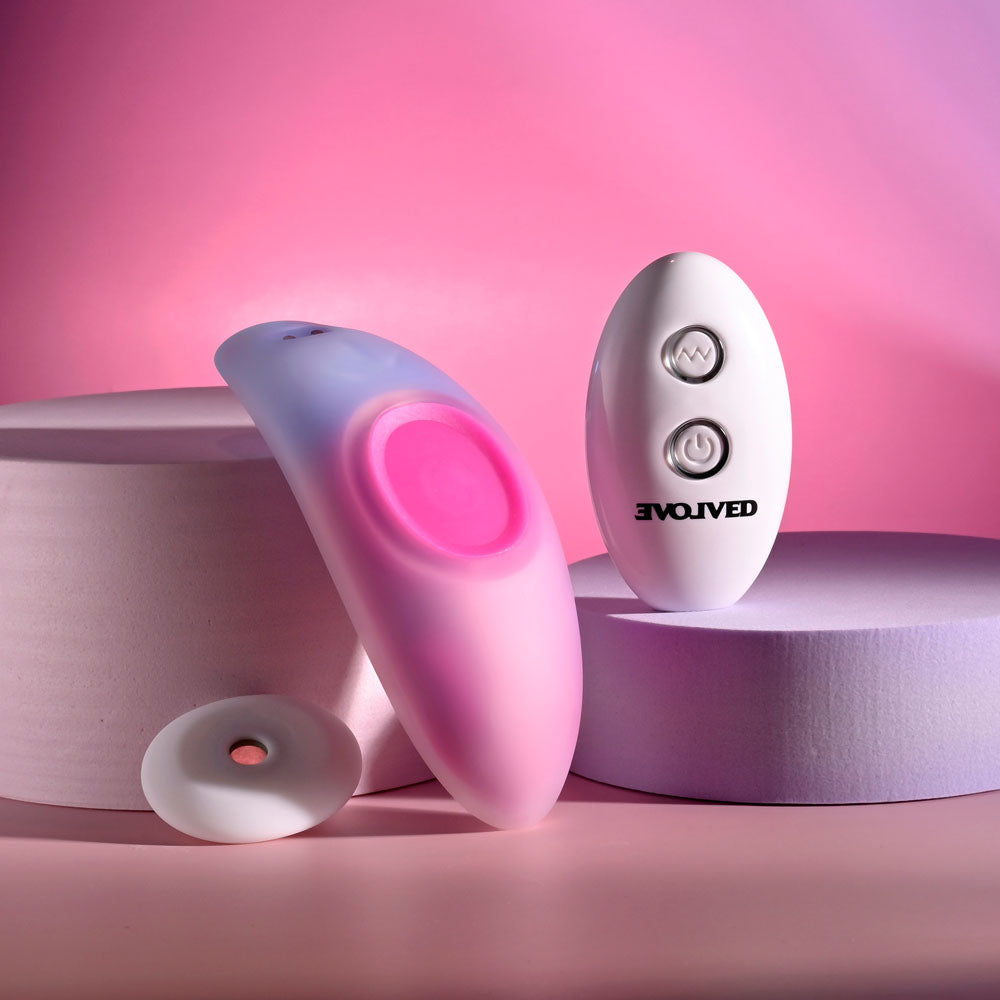 Evolved PARADISE PANTY - Pink/Purple USB Rechargeable Panty Vibrator with Remote Control on display.