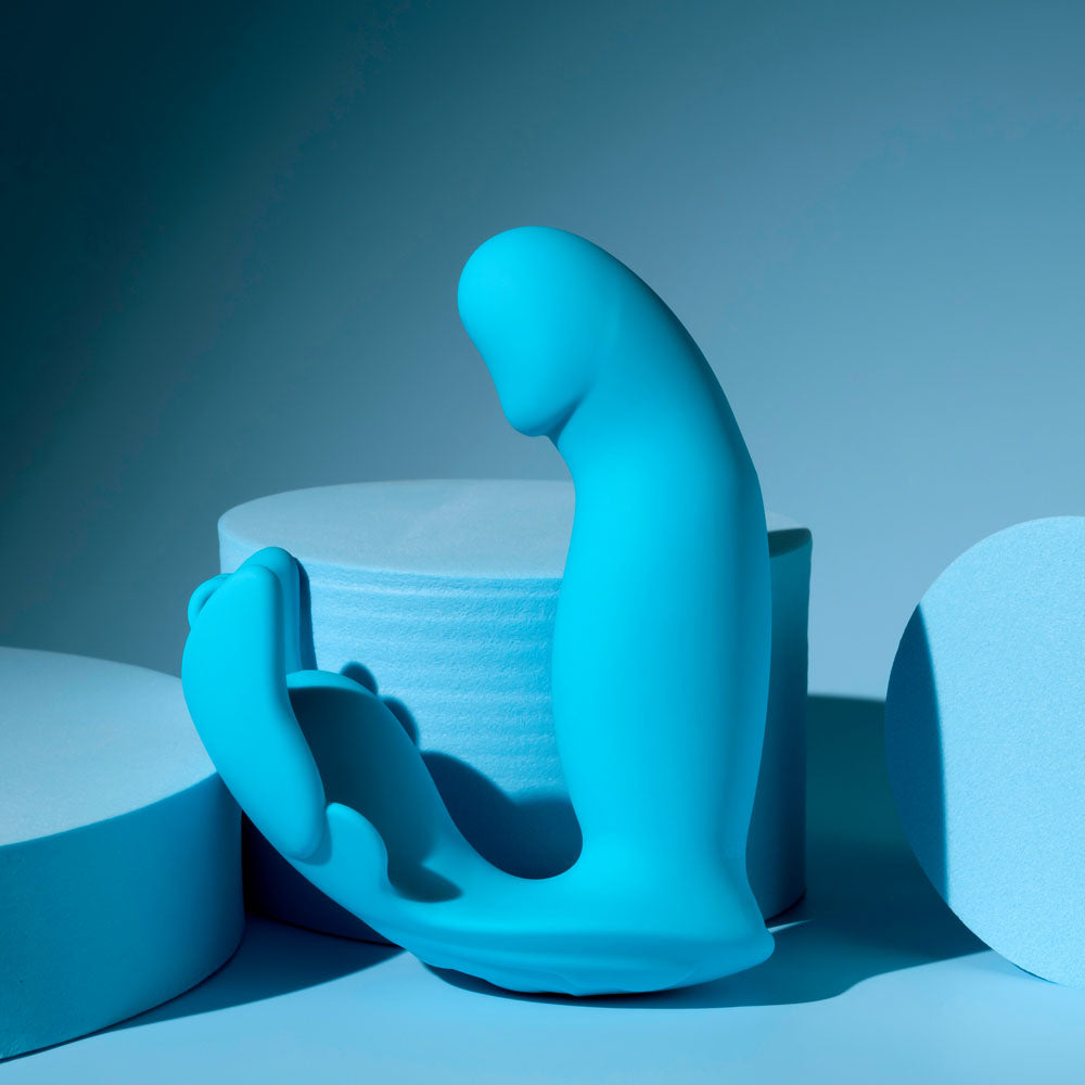 Evolved SPREAD YOUR WINGS - USB Rechargeable Wearable Butterfly Vibrator displayed on a blue background.