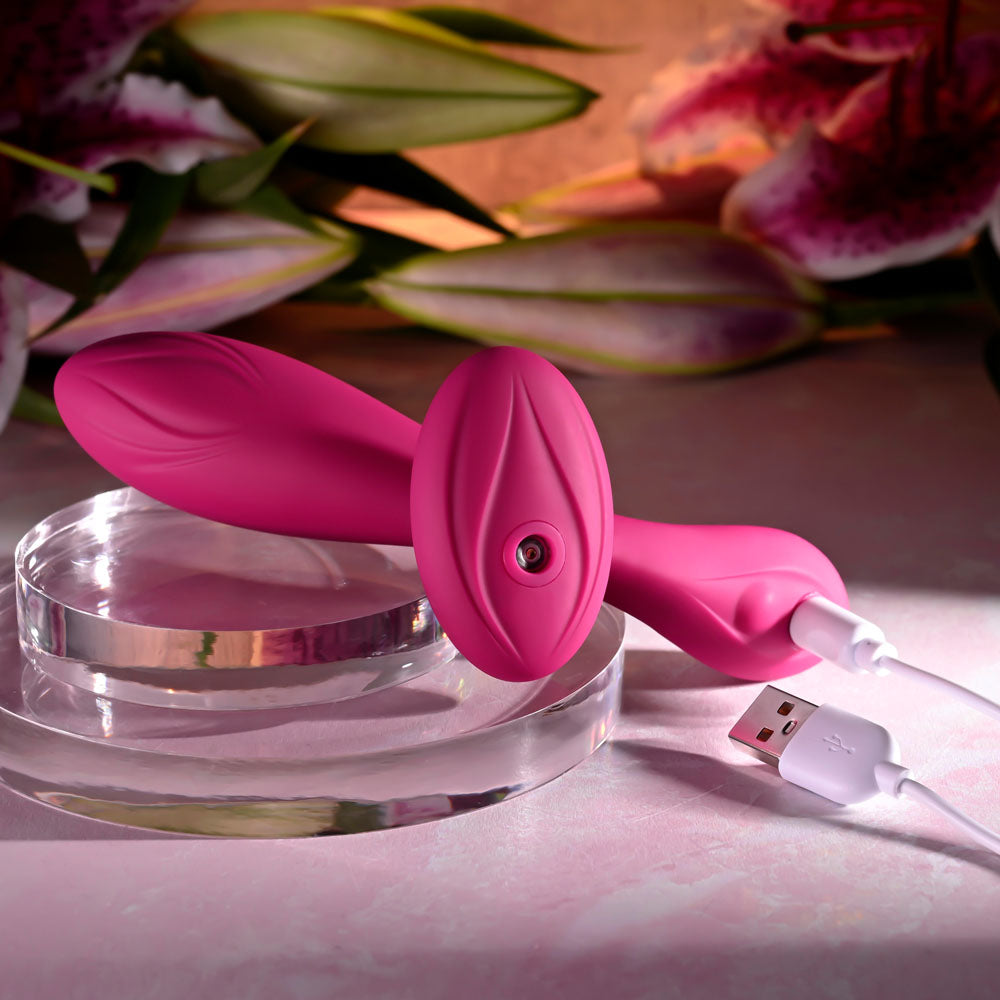 Evolved CHERRY POSE -  16.1 cm USB Rechargeable Flexible & Posable Vibrator with Remote on a glass surface.