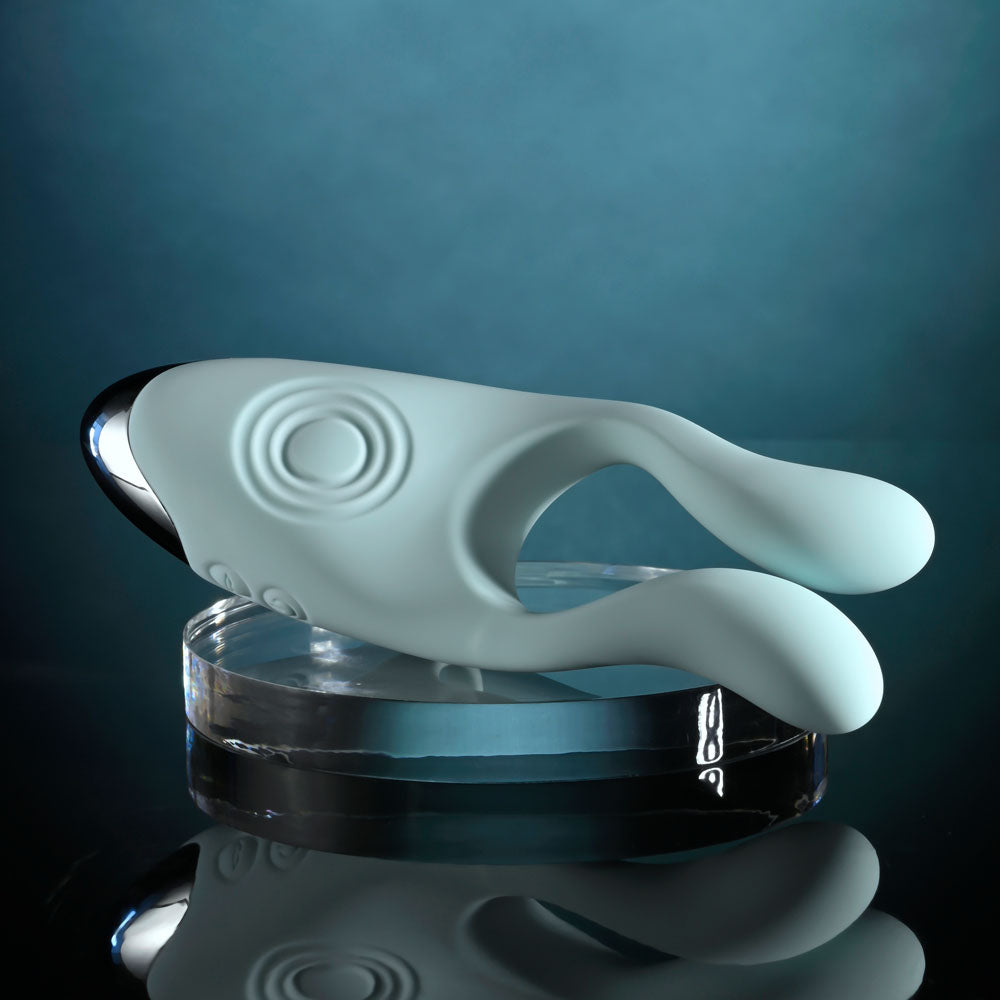 Evolved COUPLES THERAPY - Teal USB Rechargeable Couples Stimulator on a clear display with a blue background.