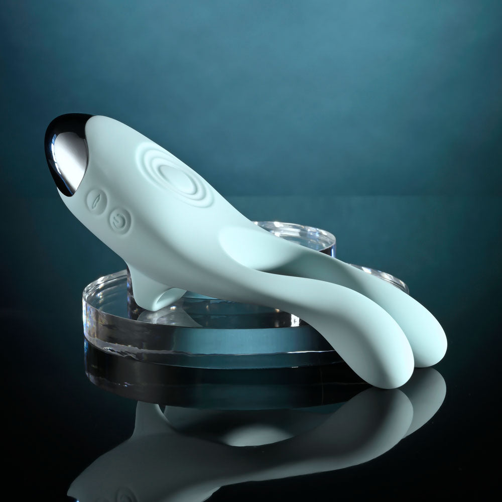 Evolved COUPLES THERAPY - Teal USB Rechargeable Couples Stimulator on a display, showcasing its sleek design.