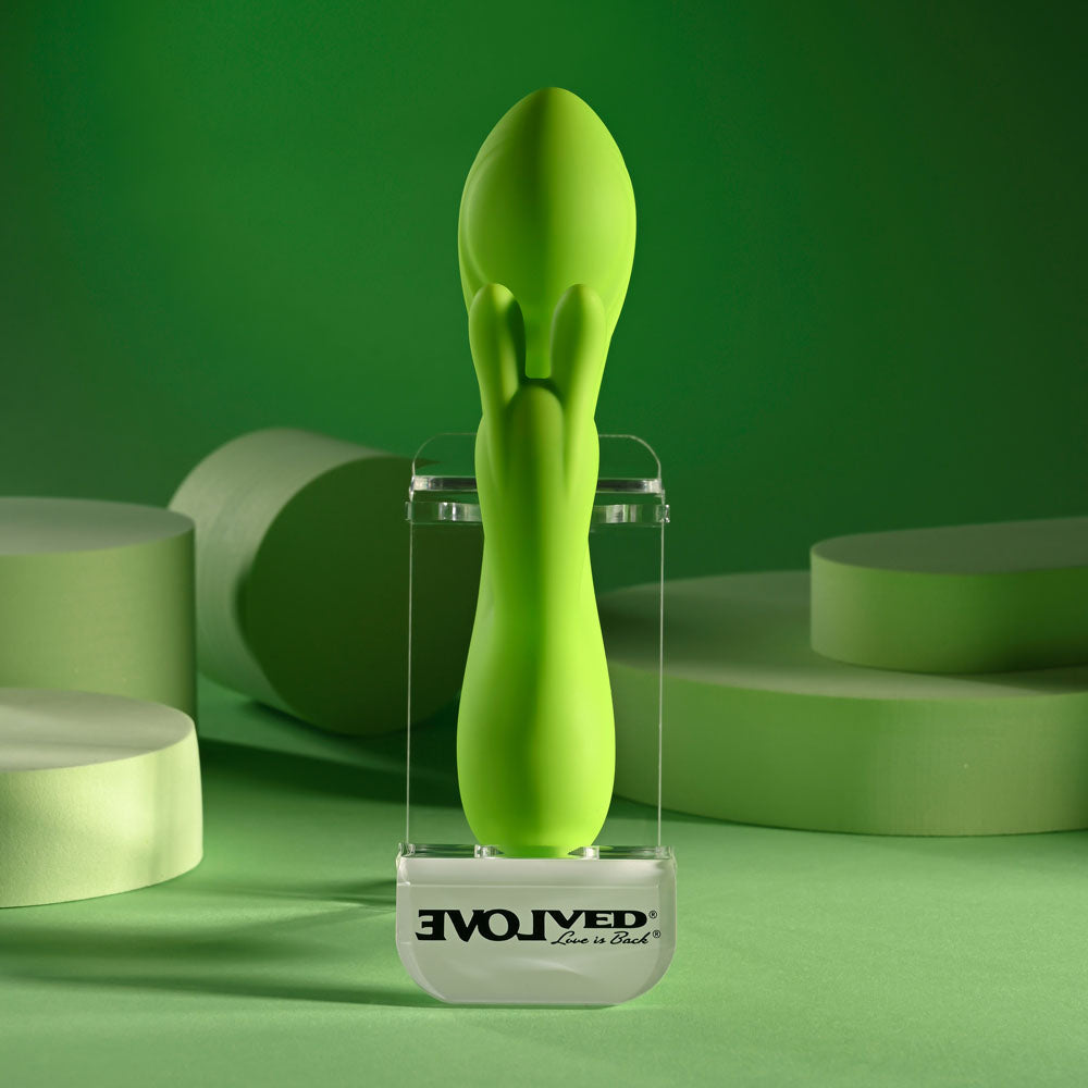 Evolved BRAT BUNNY -  16.2 cm USB Rechargeable Rabbit Vibrator displayed against a green background.