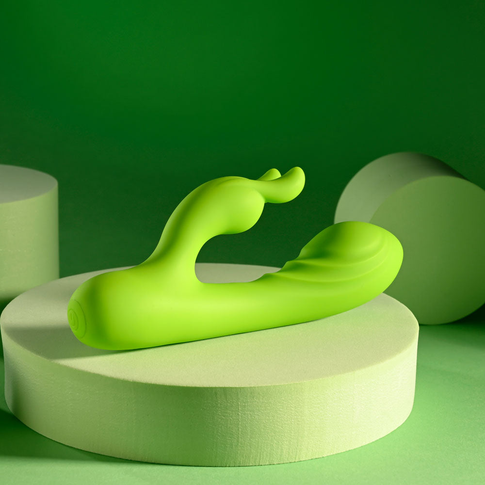 Evolved BRAT BUNNY - 16.2 cm USB Rechargeable Rabbit Vibrator on a green background, perfect for intimate essentials for her