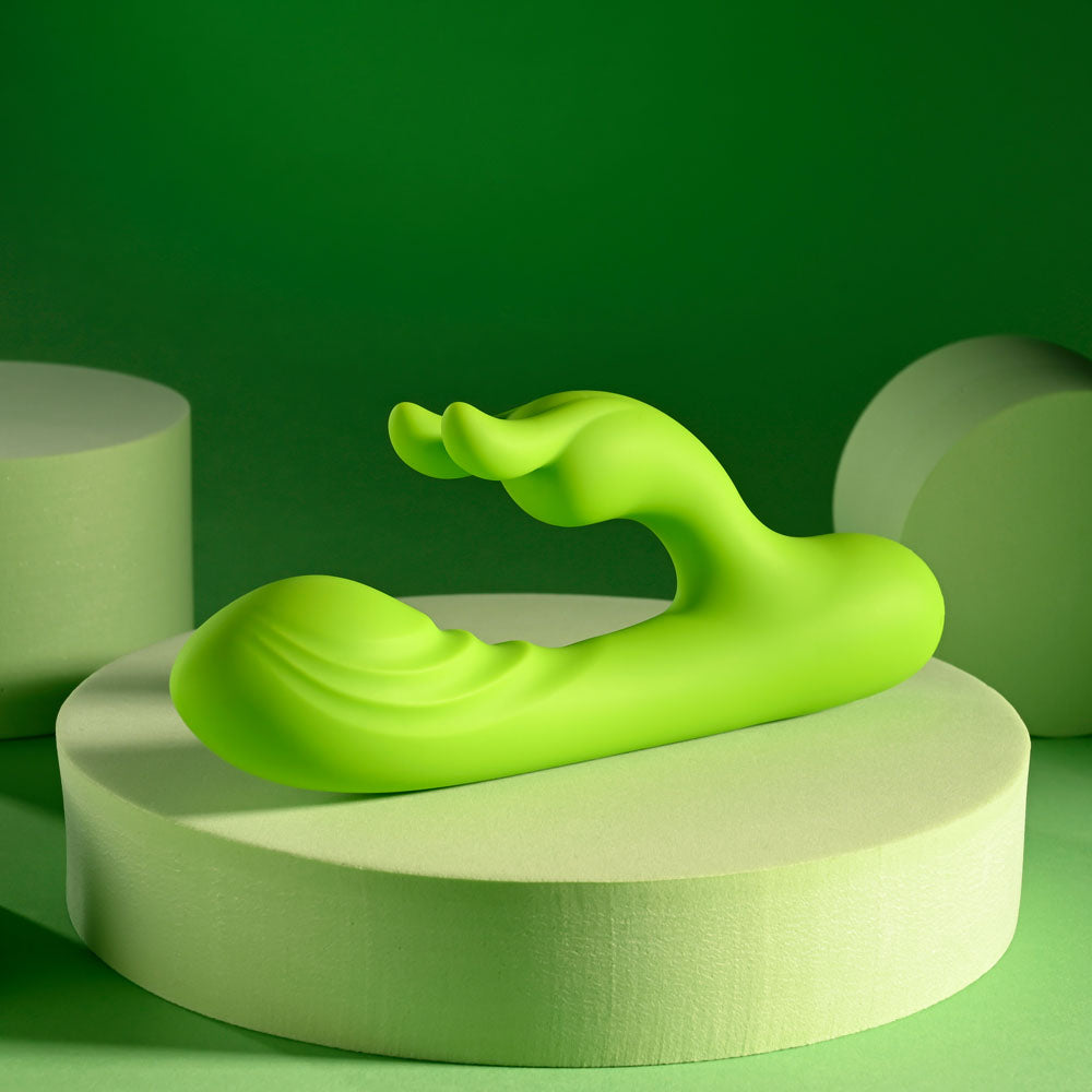 Evolved BRAT BUNNY - 16.2 cm USB Rechargeable Rabbit Vibrator on display against a green background.