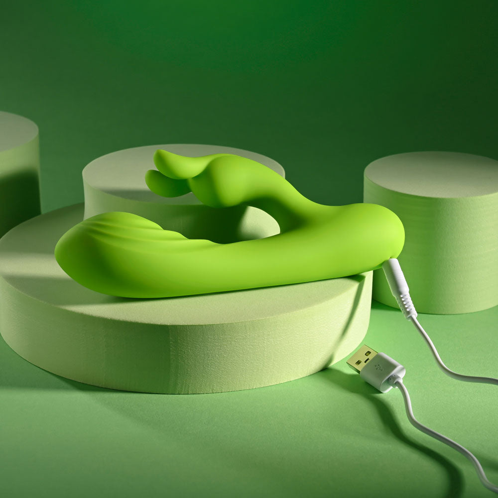 Evolved BRAT BUNNY - 16.2 cm USB Rechargeable Rabbit Vibrator on a green background with USB charging cable.