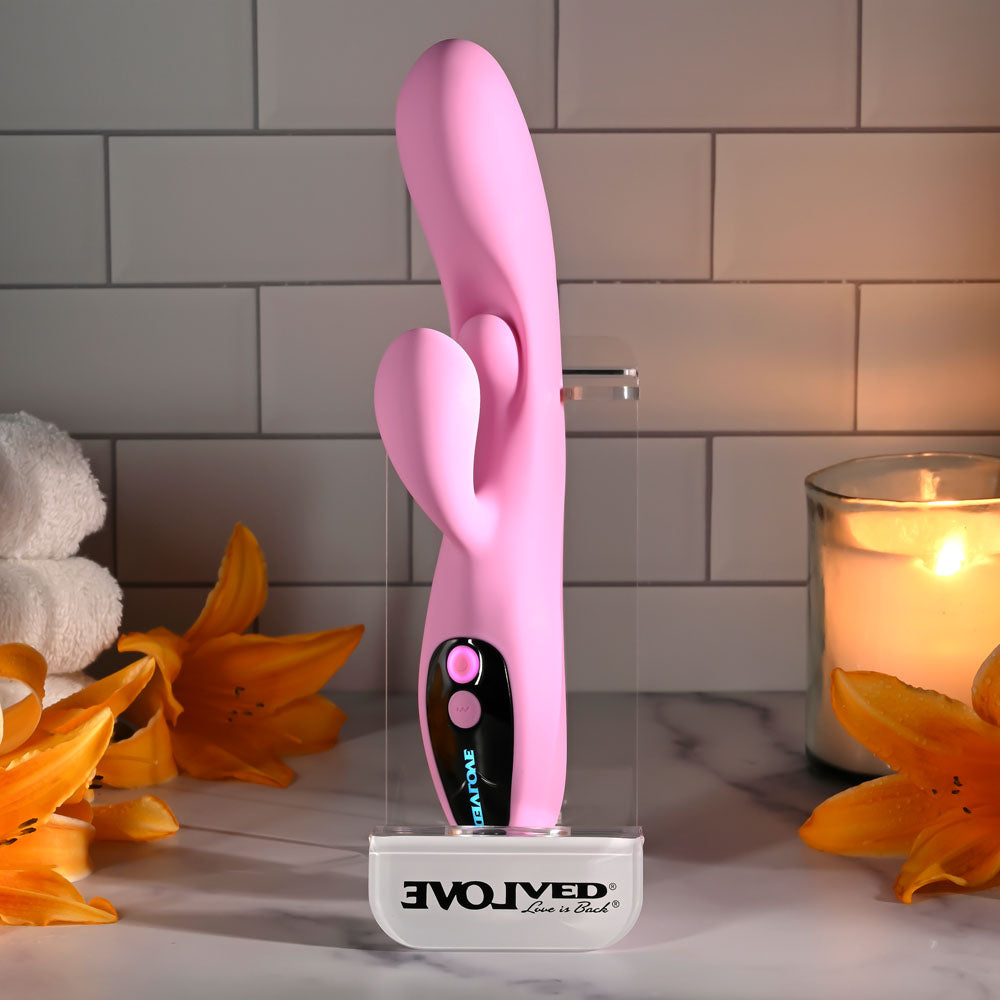 Evolved PUSH THE BUTTON -  23.5 cm USB Rechargeable Rabbit Vibrator with G-Spot Bud displayed with flowers and candles.