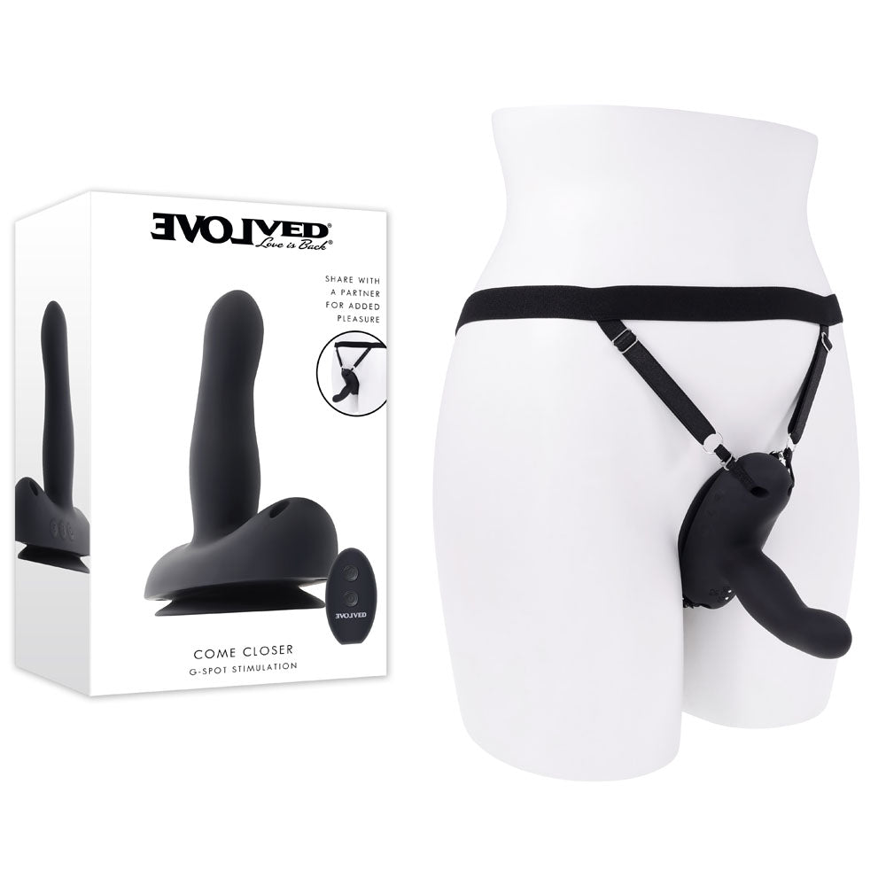 Evolved COME CLOSER -  USB Rechargeable Vibrating Strap-On with Remote displayed on a model with a harness for hands-free pleasure.