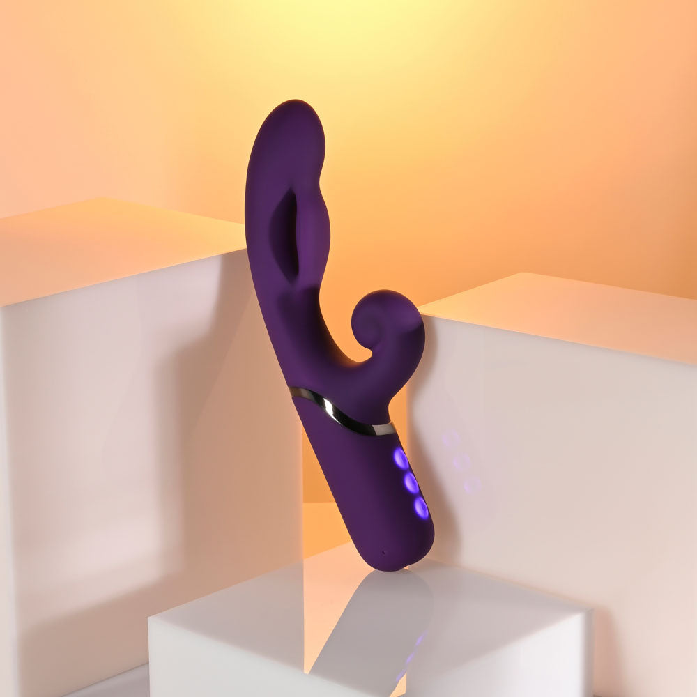 Evolved PLEASURE PUFF - inflatable rabbit vibrator on display with a sleek design and pink LED controls.