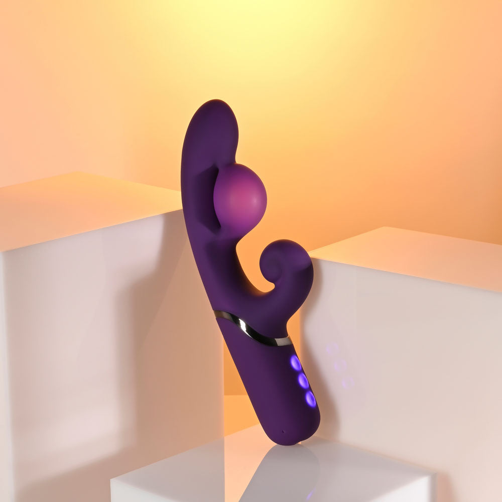 Evolved PLEASURE PUFF inflatable rabbit vibrator in vibrant purple color, showcasing its unique design and features.