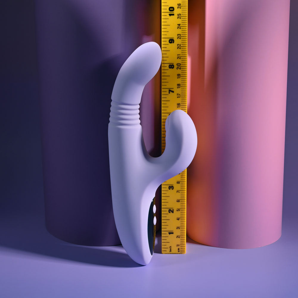Evolved PEP TALK - 23.3 cm USB Rechargeable Thrusting Vibrator with Tapping Clitoral Stimulator next to a measuring ruler.