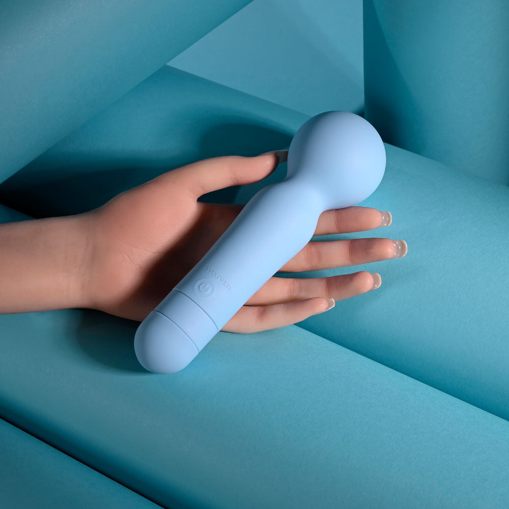 Evolved IRIS -  18.3 cm USB Rechargeable Massage Wand held in hand, made of soft silicone for pleasurable sensations.