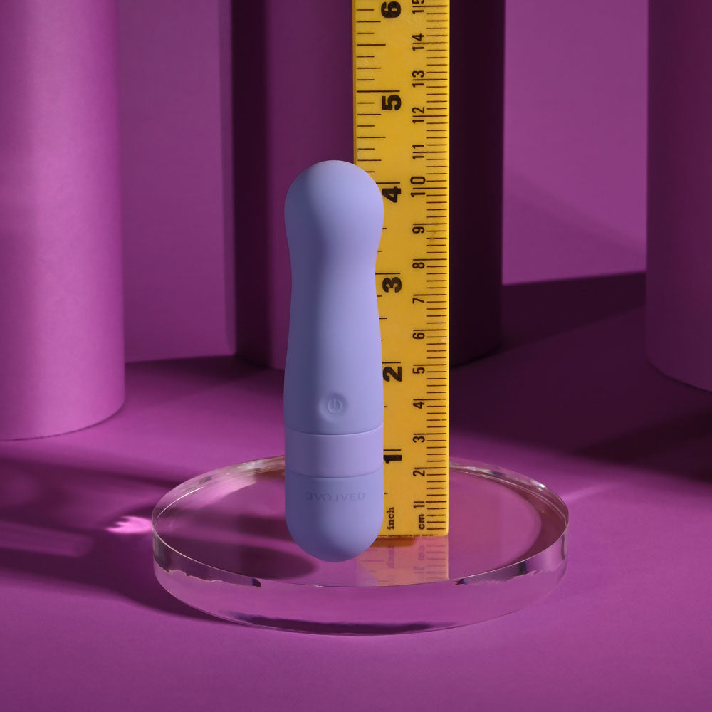 Evolved SQUISHY BULLET -  11 cm USB Rechargeable Bullet displayed with measurement on purple background.
