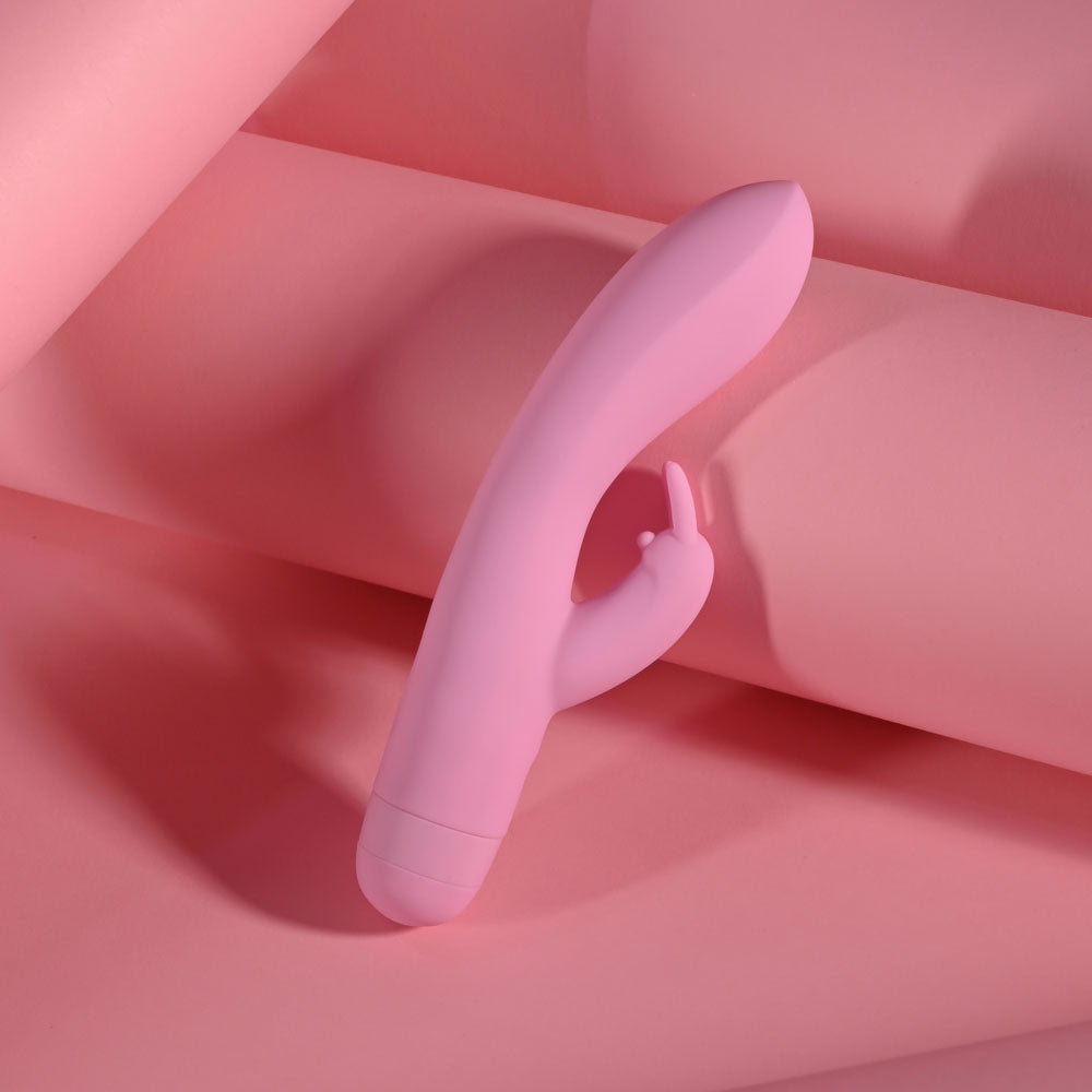Evolved CUSHY BUNNY - 19.1 cm USB Rechargeable Rabbit Vibrator on soft pink background, perfect intimate essential for her.