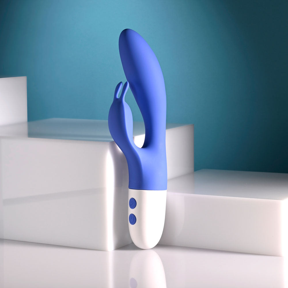 Evolved FUNNY BUNNY - 20 cm USB Rechargeable Rabbit Vibrator in blue on display for intimate essentials for her.