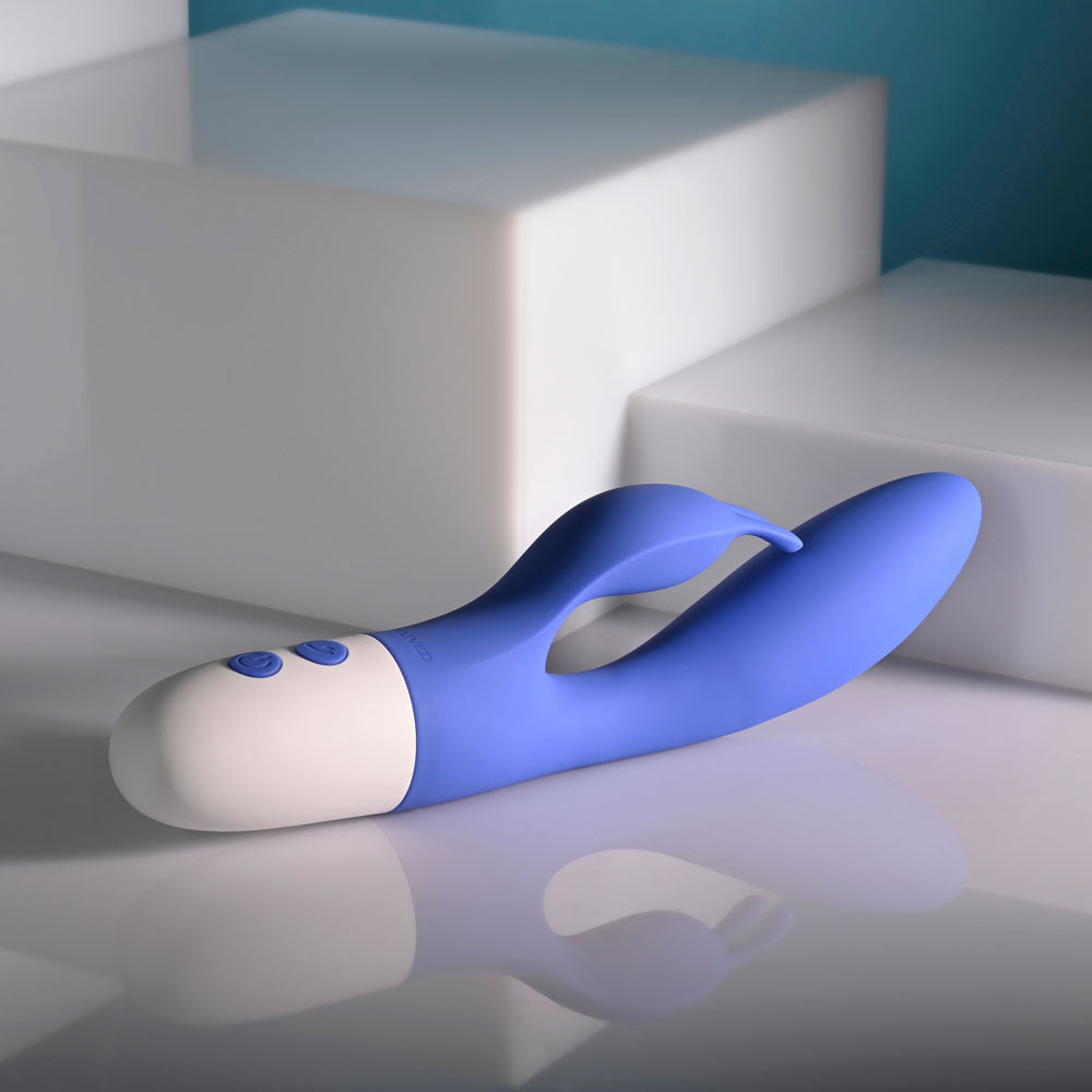 Evolved FUNNY BUNNY - 20 cm USB Rechargeable Rabbit Vibrator on a minimalist background.