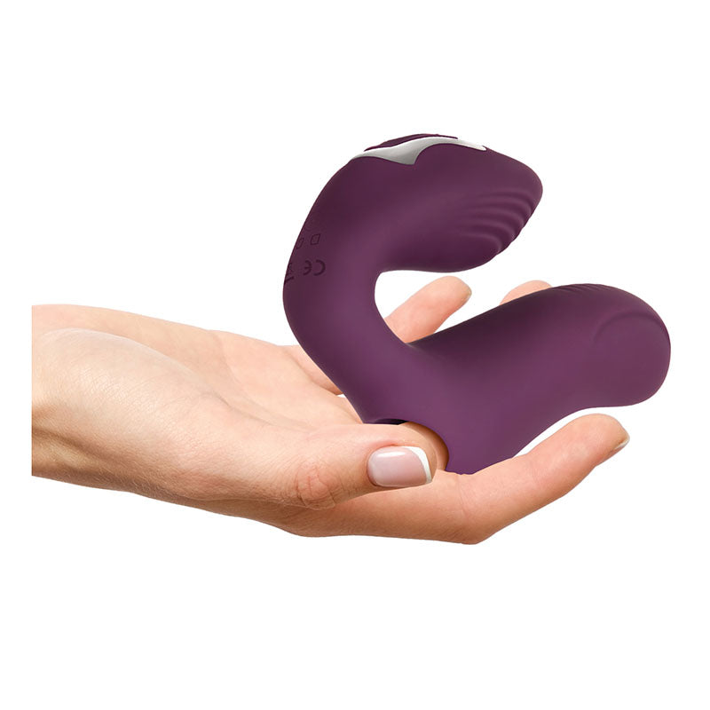 Evolved Helping Hand - USB Rechargeable Dual Finger Stimulator held in a hand for intimate essentials for her.
