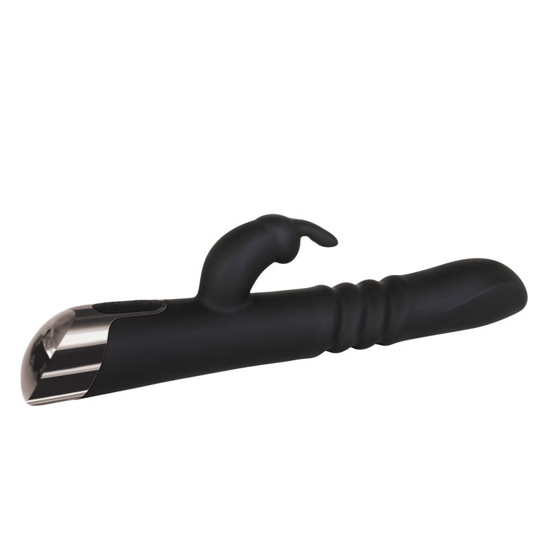 Evolved Rapid Rabbit - 25.4 cm USB Rechargeable Thrusting Rabbit Vibrator resting on a surface, showcasing its sleek black design.
