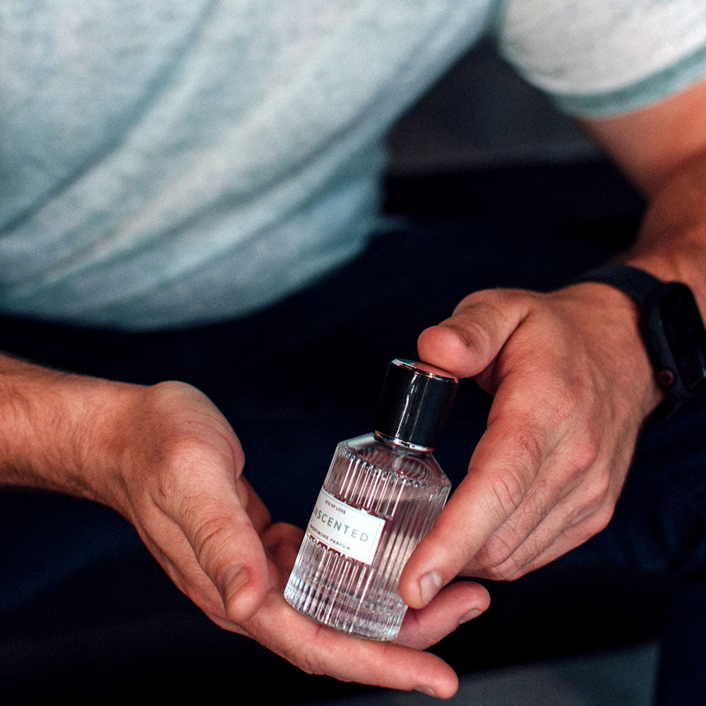 Eye Of Love Unscented Pheromone Perfume - 50 ml - Unisex Pheromone Perfume - 50 ml Spray in a person's hands.