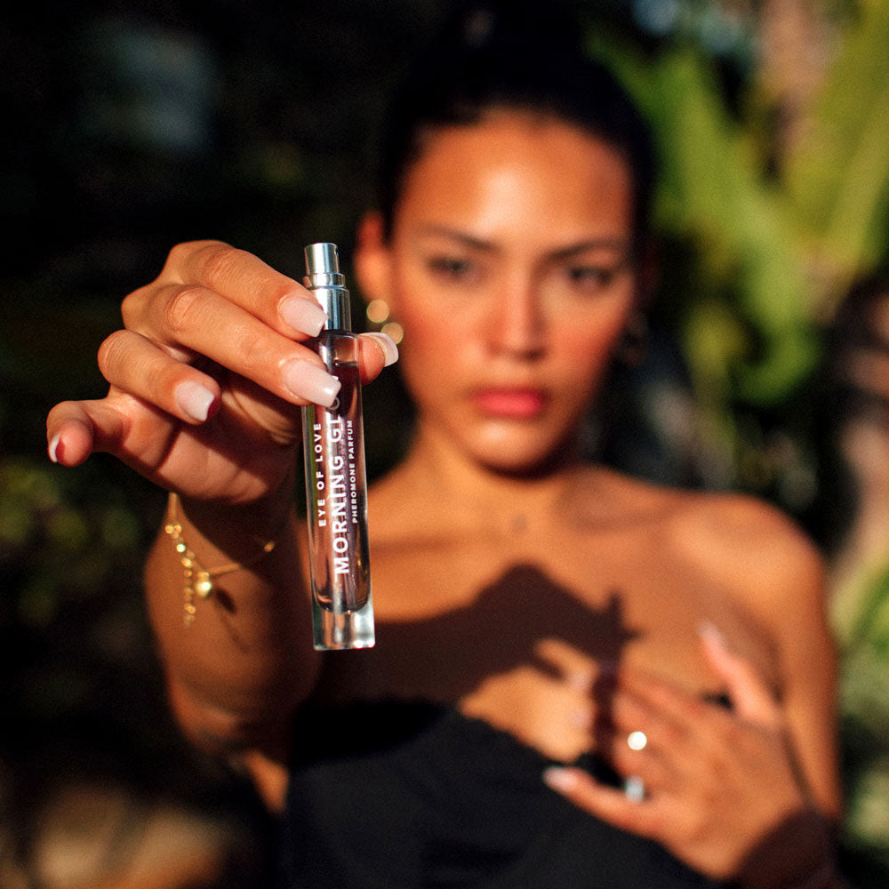 Eye Of Love Morning Glow Pheromone Perfume - 10 ml - Energising Pheromone Perfume for Women to attract Men - 10 ml Spray held by model