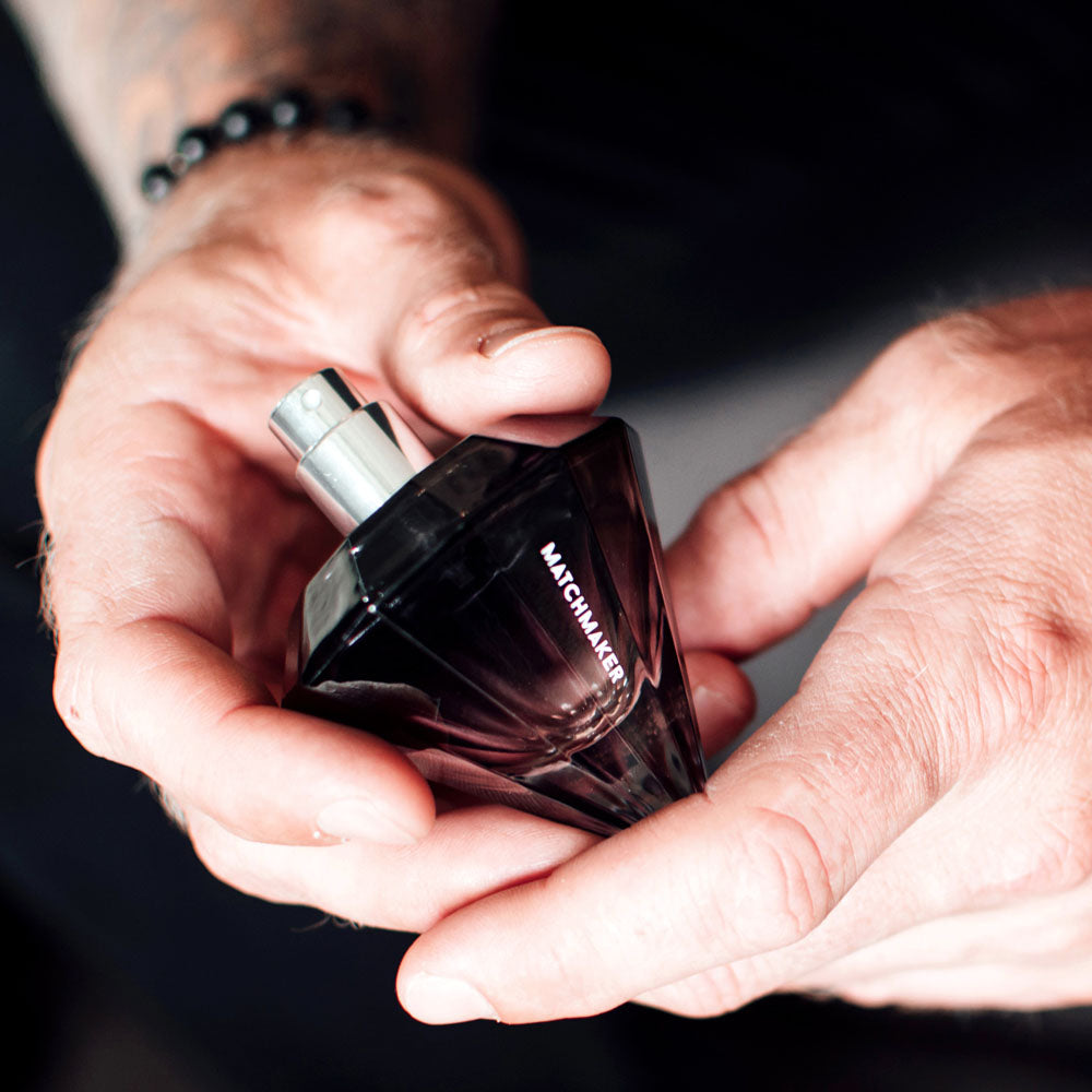 Eye of Love Matchmaker  Diamond - 30 ml - Pheromone Cologne for Men to attract Women - 30 ml Spray in a person's hands.