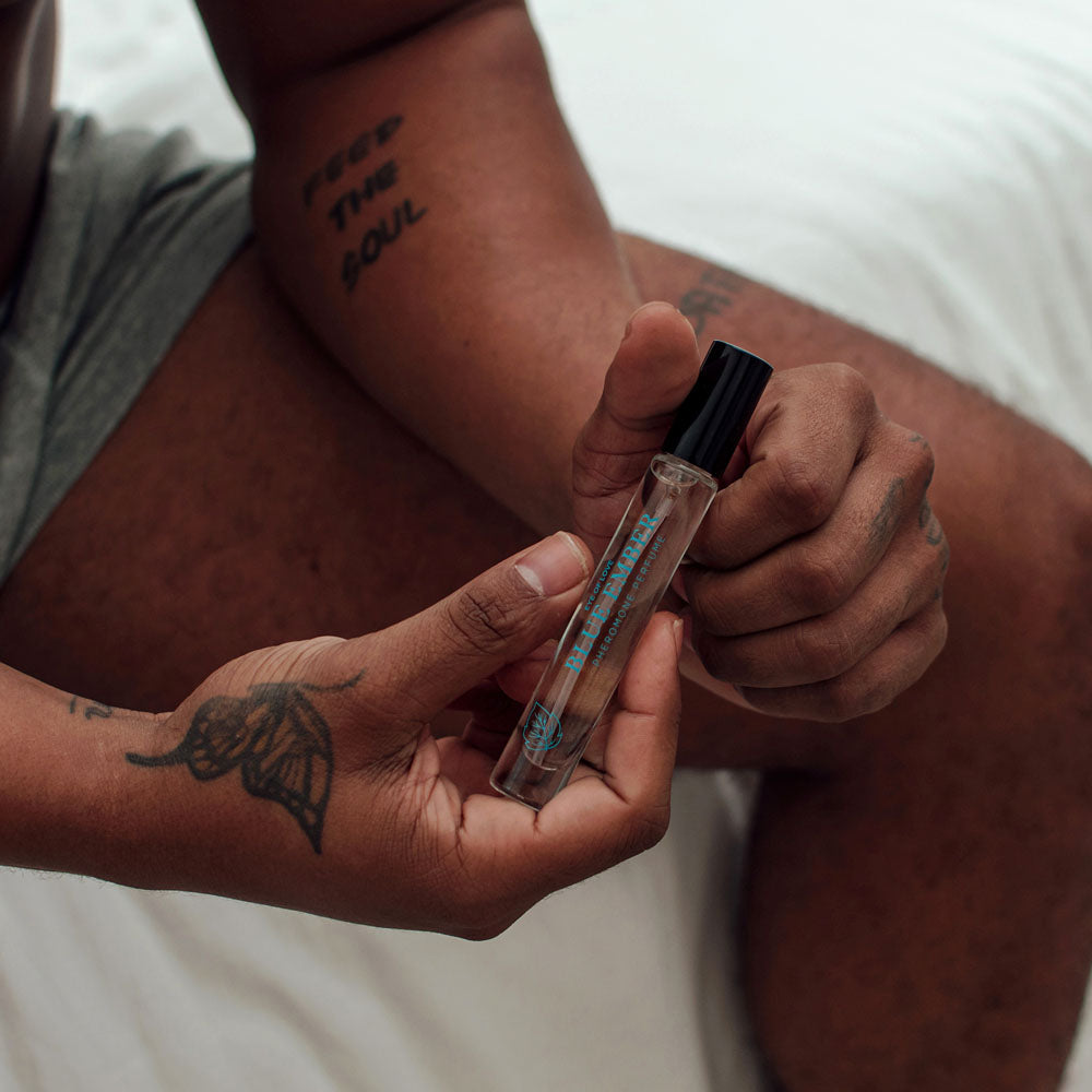 Eye Of Love Love In Bloom Blue Ember Pheromone Cologne - 10ml - Citrus & Cedar Scented Pheromone Cologne for Men to attract Women - 10 ml Spray in use