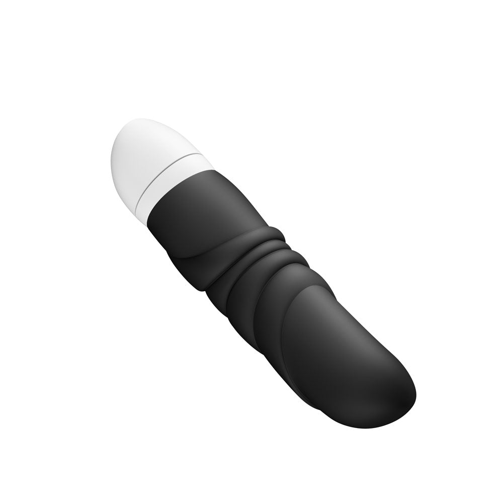 Fun Factory JAM - 12.2 cm Vibrator in sleek black silicone with ergonomic design and textured shaft for pleasure.