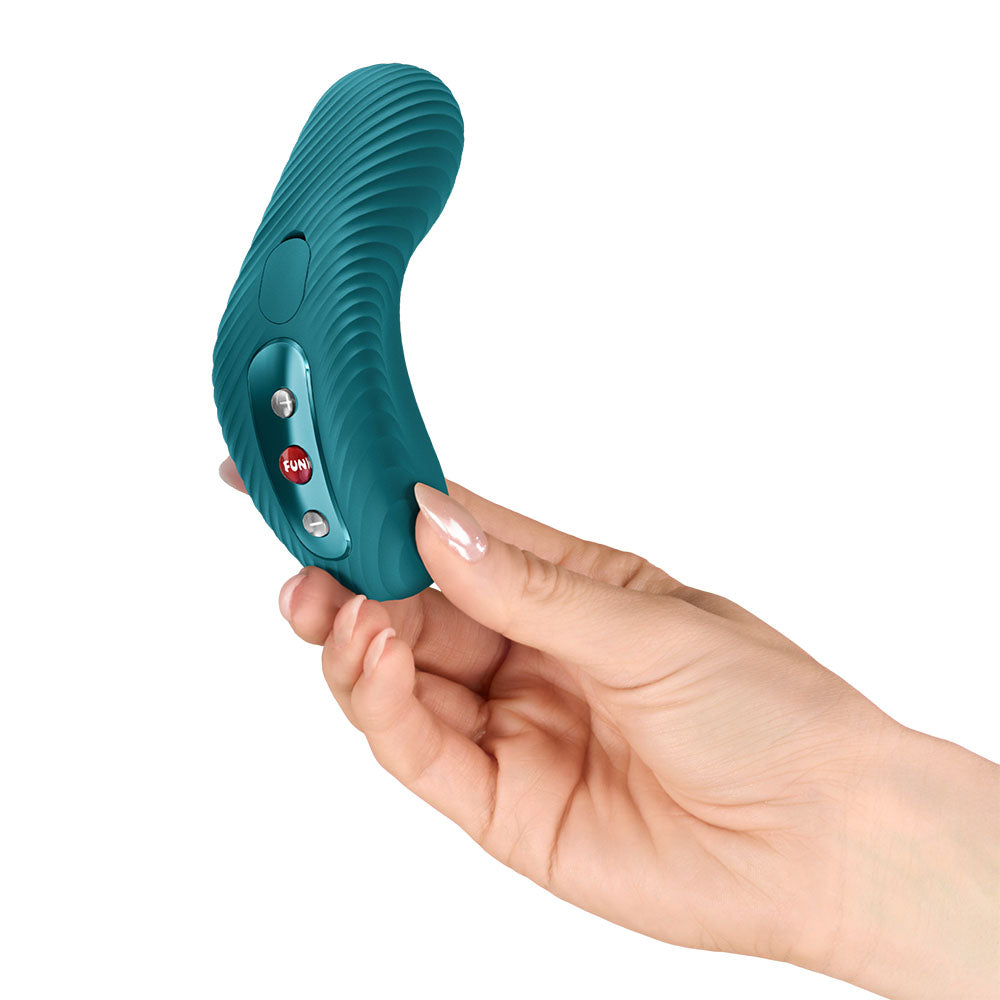 Fun Factory LAYA III Bottle  - Bottle  USB-C Rechargeable Stimulator held in a hand, showcasing its ergonomic design.