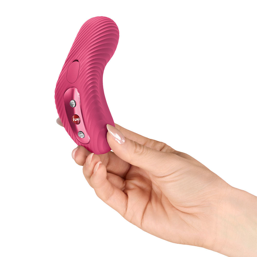 Fun Factory LAYA III Raspberry - Raspberry USB-C Rechargeable Stimulator in hand, showcasing its ergonomic design.