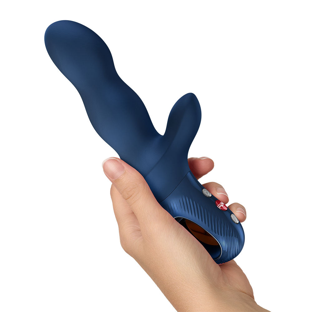 Fun Factory BI STRONIC CRAVE Nightblue - Nightblue USB-C Rechargeable Thrusting Vibrator in hand showcasing its design.