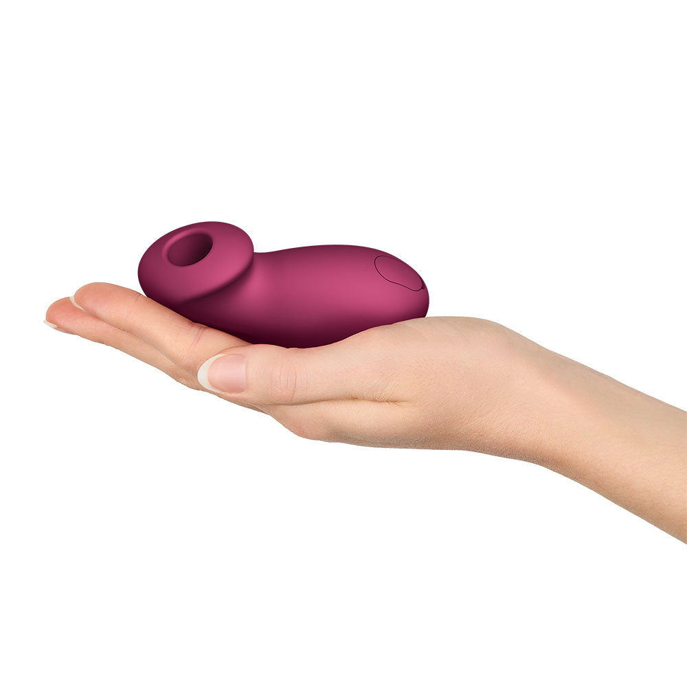 Fun Factory DESIRE Wine - Wine USB Rechargeable Air Pulse Stimulator in a hand for intimate essentials for her.
