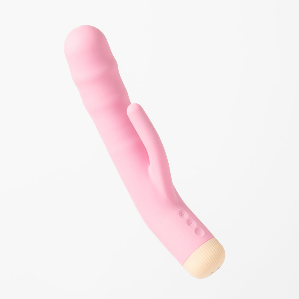 Girls Get Off - DeeDee - 19 cm USB Rechargeable Thrusting Rabbit Vibrator in pink color with textured design.