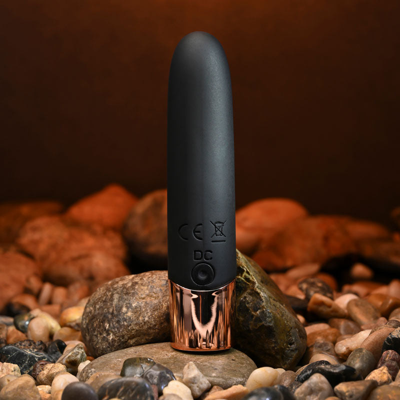 Gender X THE GOLD STANDARD - /Rose Gold 10 cm USB Rechargeable Bullet on rocks, perfect for intimate essentials for her.