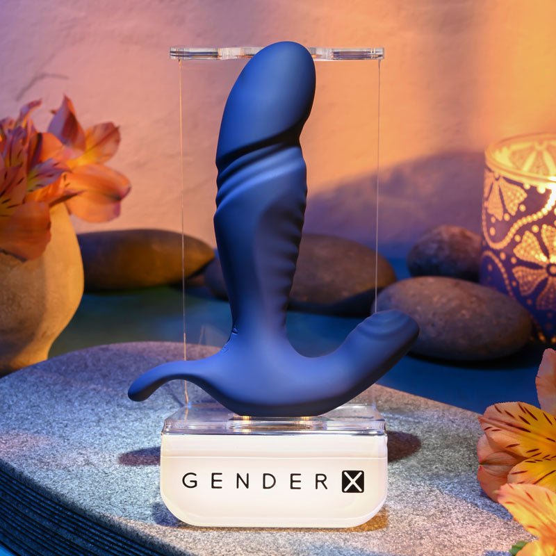 Gender X TRUE -  13.5 cm USB Rechargeable Thrusting Prostate Massager displayed elegantly on a stand.